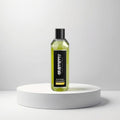 Cosmetigo.be Gummy Professional Eau De Cologne Lemon, a clear yellow liquid in a faceted bottle with a black cap and label.