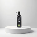 Gummy Professional After Shave Crème & Cologne in 'One Mile' scent, black pump bottle on a white pedestal.