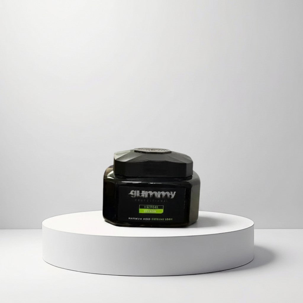 Gummy Professional Hair Gel Keratine Maximum Hold Extreme Look in a black jar with a faceted lid, displayed on a white pedestal.