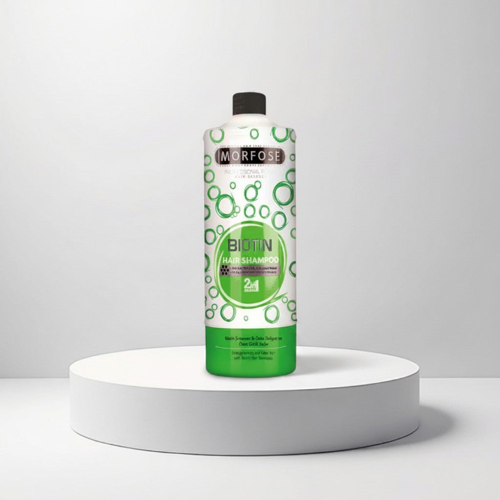 cosmetigo.be Morfose Biotin Haarshampoo, een grote fles met een groen en wit label, verrijkt met biotine voor sterker en voller haar.