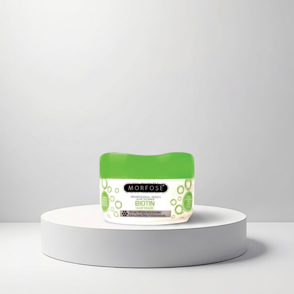 cosmetigo.be Morfose Biotine Hair Mask in a green jar, designed for all hair types to strengthen and add volume.