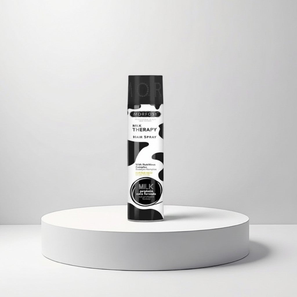 cosmetigo.be Morfose Milk Therapy Haarspray met melkproteïne en flexibele hold, zwart-wit koeienvlekken design.