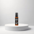 cosmetigo.be Ossion Haarserum met Argan & Keratine in oranje fles met zwarte pomp voor glans en herstel.