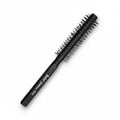 Cosmetigo.be Rodeo Gentleman 7001 black round styling brush with short bristles and an octagonal handle for precision styling and volume.