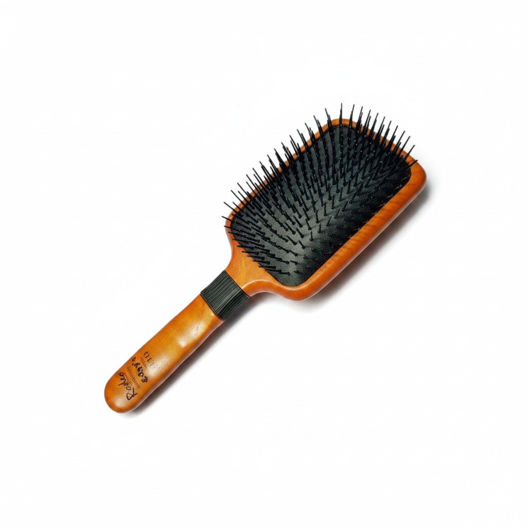 cosmetigo.be Rodeo Eddys wooden paddle brush with black bristles for detangling and styling all hair types.
