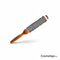 cosmetigo.be Rodeo Professional ceramic round brush with wooden handle and ventilation holes for faster drying and styling.